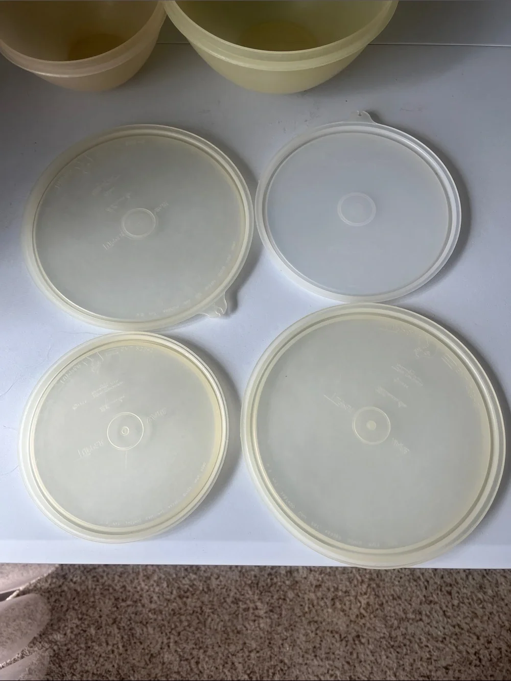 vintage Tupperware Round Food Storage Lids Set in Pale Yellow and Light Blue